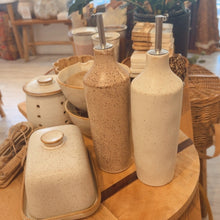 Load image into Gallery viewer, Decorative ceramic items on a wooden table with a blurred indoor background