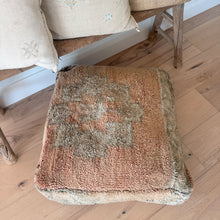 Load image into Gallery viewer, Rustic wooden stool with a patterned cushion on a wooden floor.