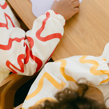 Load image into Gallery viewer, Smock Bib | Pina
