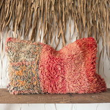 Load image into Gallery viewer, Two textured pillows on a wooden shelf against a thatched wall.
