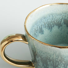 Load image into Gallery viewer, hand glazed mug with gold rim and handle
